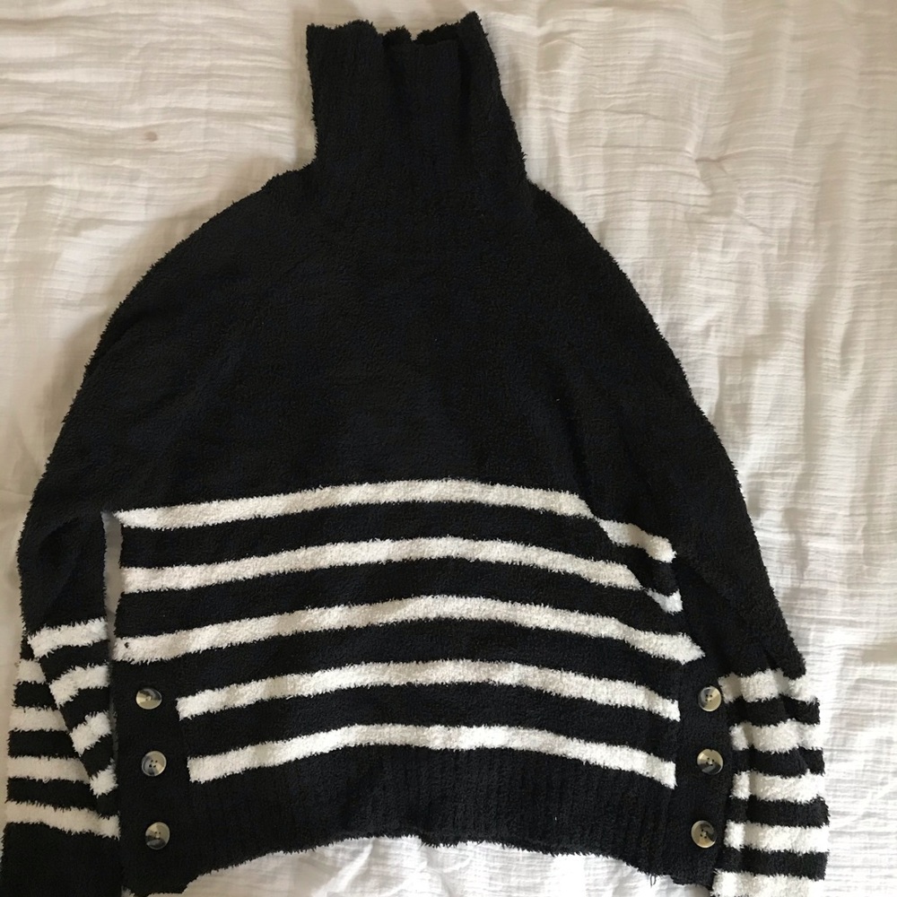 Black sweater with white stripes